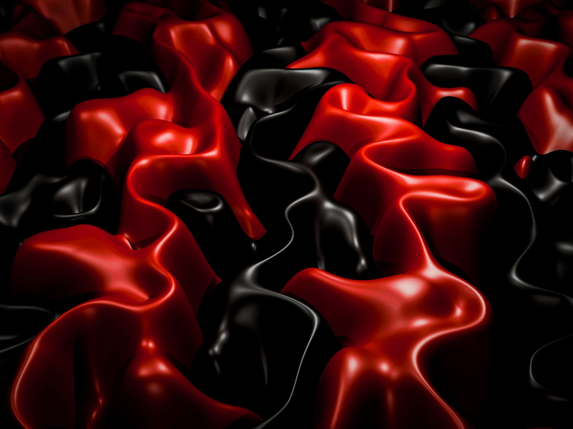 Waves of red and black lacquer catching the light.